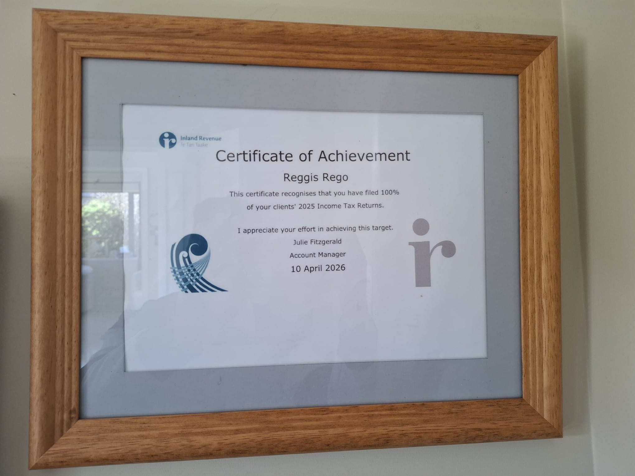 Inland Revenue Certificate of Achievement — Reggis Rego, 100% client tax returns filed 2025